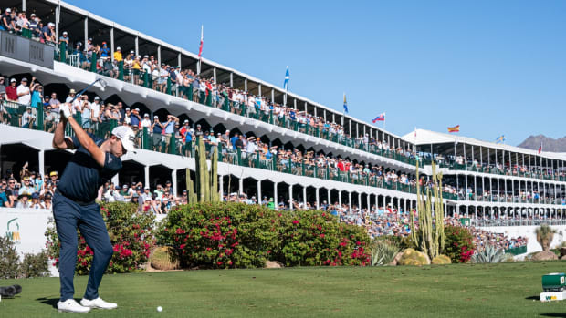 Feb 13, 2022; Scottsdale, Arizona, USA; Patrick Cantlay plays hit tee shot on the par 3 16th hole during the final round of the WM Phoenix Open golf tournament. Mandatory Credit: Allan Henry-USA TODAY Sports